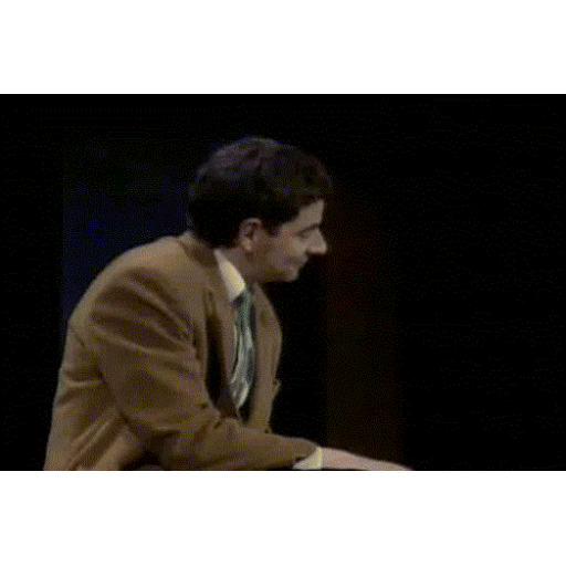 Mr. Bean's sly grin GIF - Sticker for WhatsApp