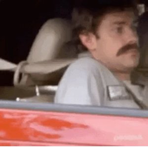 Dude rolls window up