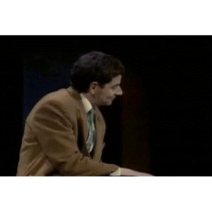 Mr. Bean's sly grin
