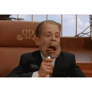 Richie Rich magnifying face