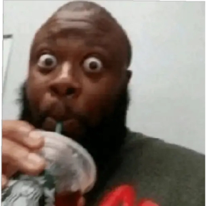 Sipping tea with wide eyes
